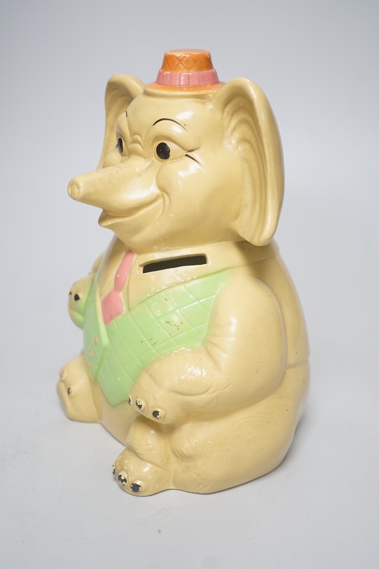An Ellgreave pottery seated Elephant money bank, 22cm